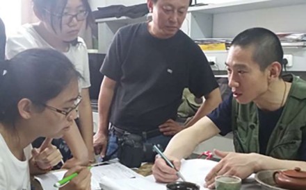 Han Chunyu (right) pictured explaining his team’s findings to journalists. Photo: SCMP Pictures