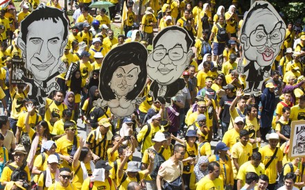 Activists from the Coalition for Clean and Fair Elections (Bersih), march during a rally in Kuala Lumpur. Photo: AP