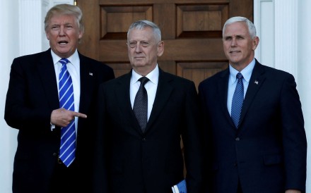 US president-elect Donald Trump (left) and vice-president-elect Mike Pence (right) greet retired General James Mattis in Bedminster, New Jersey, on Saturday. Photo: Reuters