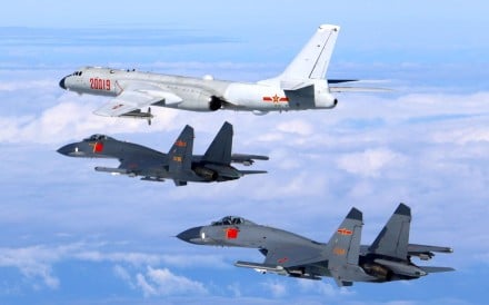Pictures released by the Chinese air force on Sunday show a PLA H-6K bomber and two J-11 fighter jets on an unspecified training mission. Photo: Xinhua