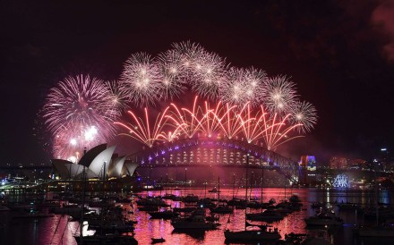 Fireworks illuminate the sky over the iconic Opera House and Harbour Bridge in Sydney. Photo: AFP Fireworks illuminate the sky over the iconic Opera House and Harbour Bridge in Sydney. Photo: AFP