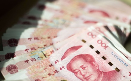 Many mainland economists say the yuan needs to be freer to find its value. Photo: AFP Many mainland economists say the yuan needs to be freer to find its value. Photo: AFP