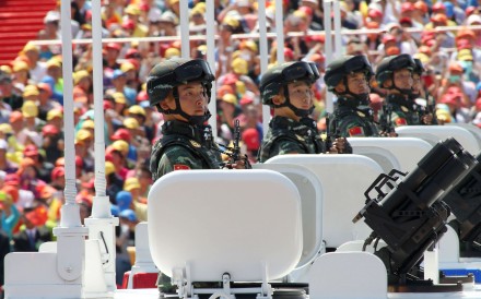 PLA troops pictured taking part in a military parade in the centre of Beijing two years ago. Photo: Simon Song