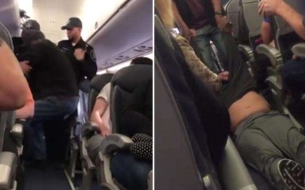 Officers drag David Dao through the cabin of a United Airlines flight from Chicago after he was chosen at random to leave the overbooked flight but refused to give up his seat. Photo: Twitter Officers drag David Dao through the cabin of a United Airlines flight from Chicago after he was chosen at random to leave the overbooked flight but refused to give up his seat. Photo: Twitter