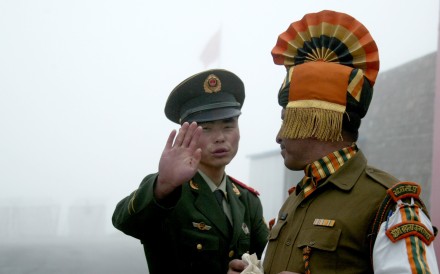 A file picture of Chinese and Indian guards at the Nathu La border crossing. Photo: AFP