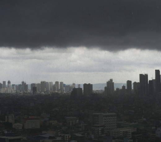 Dark storm clouds over the Manila skyline. Before Singapore, before Hong Kong, Manila was the undisputed centre of commerce in Asia Pacific. Photo: AFP Dark storm clouds over the Manila skyline. Before Singapore, before Hong Kong, Manila was the undisputed centre of commerce in Asia Pacific. Photo: AFP