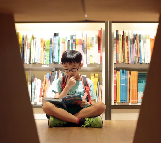 An engrossed young reader at the Eslite Spectrum bookstore at Star House in Tsim Sha Tsui on October 2 last year. Visitors can also buy refreshments, jewellery, arts and crafts, handbags, skincare and organic products. Photo: Bruce Yan