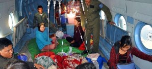 A Myanmar Military News showing soldiers helping wounded people on the military helicopter in Lashio, Shan State, northern Myanmar, on Sunday. Photo: EPA A Myanmar Military News showing soldiers helping wounded people on the military helicopter in Lashio, Shan State, northern Myanmar, on Sunday. Photo: EPA