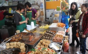 Customers buy fishballs in a snack shop at the junction of Argyle Street and Portland Street, Mongkok. Photo: Edward Wong Customers buy fishballs in a snack shop at the junction of Argyle Street and Portland Street, Mongkok. Photo: Edward Wong