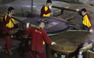 Workers producing Chinese liquor, most often referred to as baijiu, at Luzhou Laojiao in Luzhou, Sichuan province. Photo: Dickson Lee