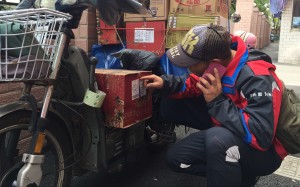 Shanghai courier has to double his typical daily deliveries in 19-hour days for a week