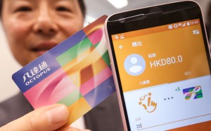 Sunny Cheung, chief executive of Octopus Cards, with the new version of the O! ePay app. Photo: Dickson Lee