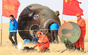 Technicians examine the Shenzhou-11 re-entry capsule in Inner Mongolia on Friday. Photo: Xinhua Technicians examine the Shenzhou-11 re-entry capsule in Inner Mongolia on Friday. Photo: Xinhua