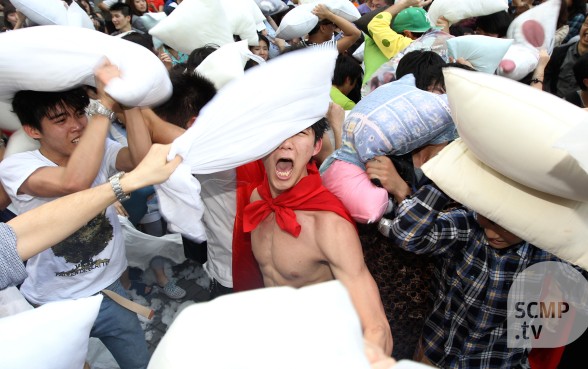 Feathers fly on International Pillow Fight Day
