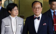 Former Hong Kong Chief Executive Donald Tsang Yam-kuen (right) accompanied by his wife Selina Tsang Pou Siu-mei arrive at the Eastern Court in Sai Wan Ho. 13NOV15