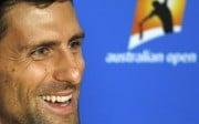 Serbia's Novak Djokovic reacts during a news conference on the eve of his final match against Britain's Andy Murray, at the Australian Open tennis tournament at Melbourne Park, Australia, January 30, 2016. REUTERS/Tyrone Siu