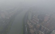 Good for the environment? China’s notorious smog clouds cover residential buildings in Nanjing, Jiangsu province. Photo: Reuters Good for the environment? China’s notorious smog clouds cover residential buildings in Nanjing, Jiangsu province. Photo: Reuters