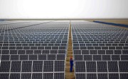 A solar farm in Dunhuang, Gansu Province. China is now the world’s biggest market for green bonds, which raise funds for environmentally beneficial projects. Photo: Reuters