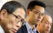Standard Working Hours Committee member Stanley Ng Chau-pei (centre) said he hoped the committee would study their report. Photo: Felix Wong