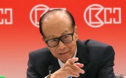 Li Ka-shing, founder and chairman of CK Property Holdings and CK Hutchison Holdings, announces the first set of full-year results for both companies after a reorganisation of his corporate holdings. Photo: K. Y. Cheng