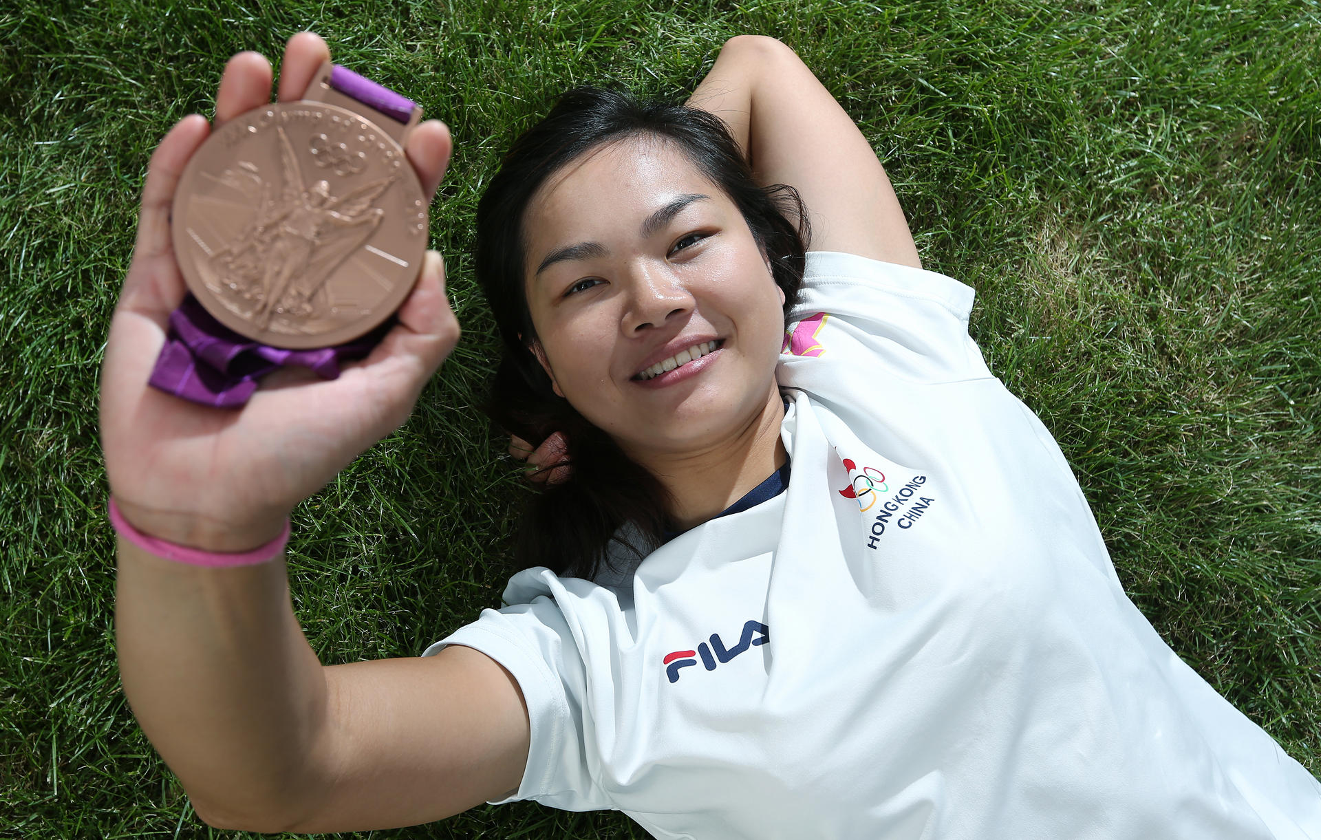 Hong Kong cyclist Lee Wai-sze with her keirin bronze medal.Photo: Felix Wong