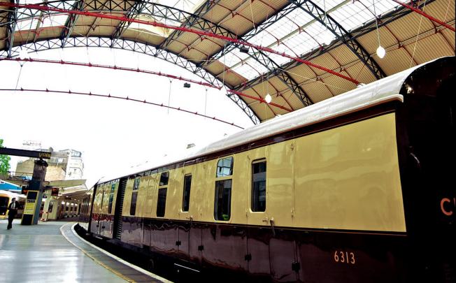 The Orient-Express British Pullman pulls up at London's Victoria Station.