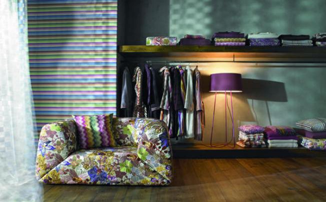 Bold patterns are back in vogue, but avoid putting all the pieces together on one side of the room.