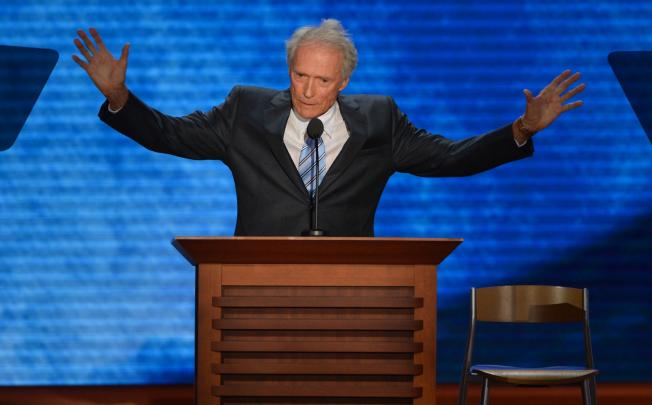 During his speech, director Clint Eastwood looked down several times at an empty chair, as if he was listening to Obama criticise Republican presidential nominee Mitt Romney. Photo: AFP