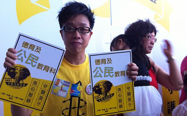Amnesty International member Connie Chan Man-wai poses at the anti-national education protest in Tamar Park on Saturday. Photo: Jennifer Cheng