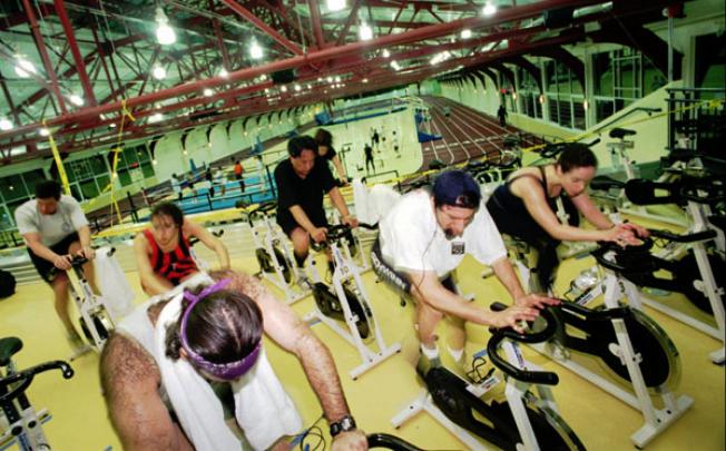 We need to do more to popularise regular exercise to enhance community well-being. Photo: AP