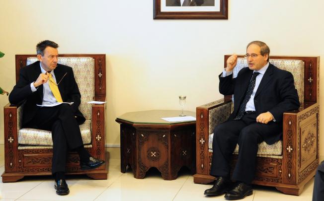 Syrian Deputy Foreign Minister Faisal al-Miqdad (R) meets with the President of the International Committee of the Red Cross Peter Maurer in Damascus. Photo: AFP 