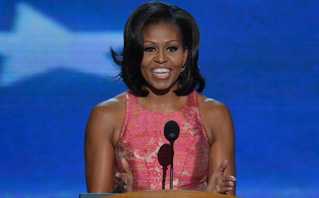 US first lady Michelle Obama urges re-election for Barack Obama, saying "we are playing a long game here" in her speech on the opening night of the Democratic National Convention on Tuesday. Photo: AFP