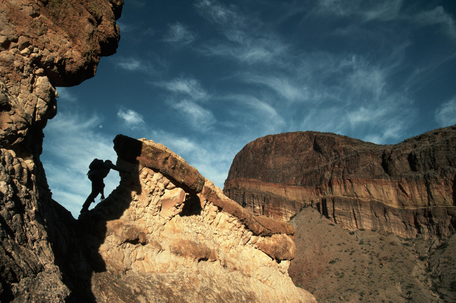 A climber tackles volcanic rock below Burro Mesa. Photo: Corbis