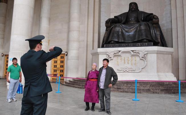 It's a picture of change as Mongolians flock to the Genghis Khan statue which until recently was off-limits to the public. Photo: Michael Kohn