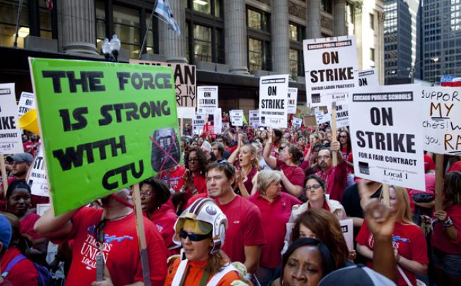 Thousands of public school teachers rally outside the Chicago Public Schools district headquarters on the first day of strike action on Monday. Photo: AP