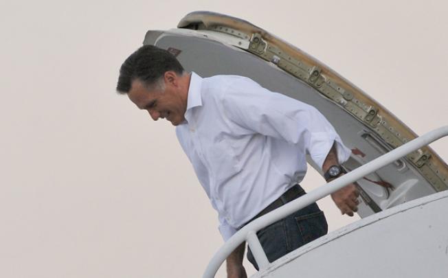 US Republican presidential candidate Mitt Romney arrives in Los Angeles on Sunday. Photo: AFP