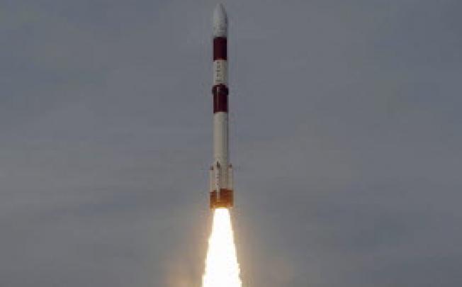 India's polar satellite launch vehicle blasts off from the Sriharikota spaceport near Chennai. India plans to launch aprobe that will orbit Mars in November next year. Photo: AFP