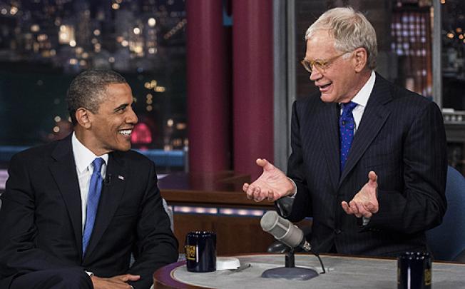 Barack Obama offers his first response to Mitt Romney’s taped remarks on David Letterman's late-night talk show on Tuesday. Photo: AFP