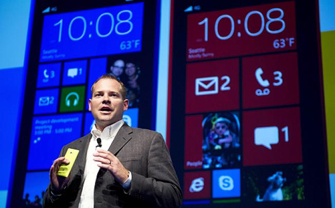 HTC's Jason Mackenzie introduces the new HTC 8S and HTC 8X smartphones in New York on Wednesday. Photo: AFP