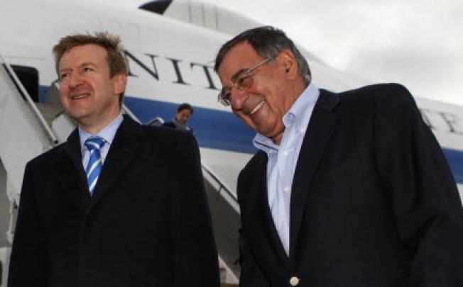 US Secretary of Defence Leon Panetta (right) is welcomed to Auckland by New Zealand's Minister of Defence Jonathan Coleman on Friday. Photo: AFP