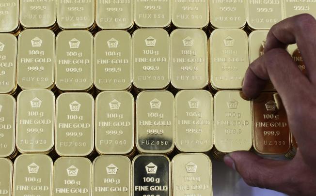 Gold ingots shine at the Indonesian Antam metal refinery. High-net-worth people are using gold as a hedge against inflation. Photo: Reuters