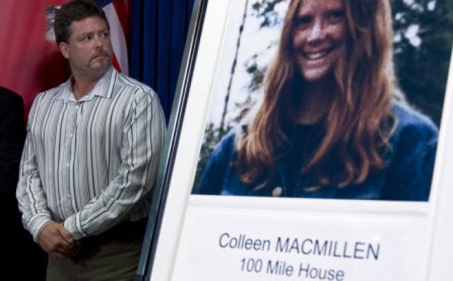 Shawn MacMillen, brother of murder victim Colleen MacMillen, looks towards a poster of his sister during a news conference in Surrey, British Columbia, Canada on Tuesday. Photo: Associated Press