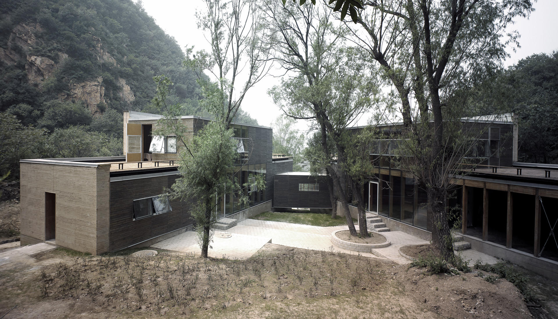 Yung Ho Chang and some of his works: Split House by the Great Wall; 1966-76 Major Events Pavilion in Anren, Sichuan; Shanghai Corporate Pavilion; The Bay Garden, Qingpu district, Shanghai. Photo: Simon Song