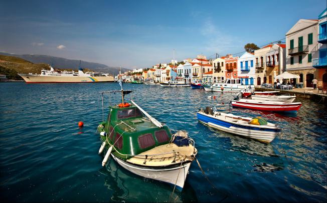 The picturesque harbour and village of Kastelorizo island in Greece's Aegean Sea. Photo: Alamy