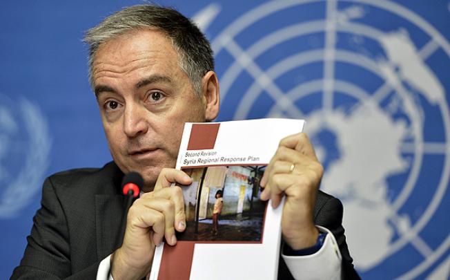UNHCR's Panos Moumtzis speaks about the launch of the revised response plan for Syrian refugees at the United Nations headquarters in Geneva. Photo: EPA
