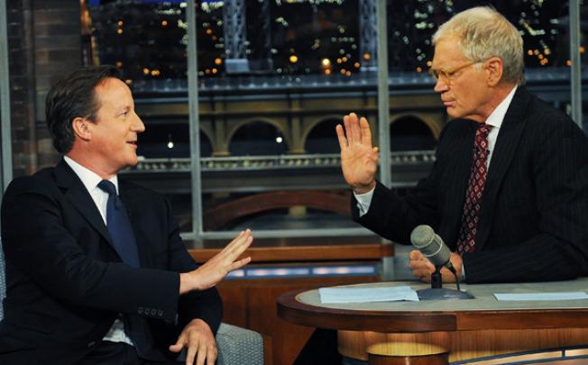UK Prime Minister David Cameron talks with David Letterman in New York. Photo: AP