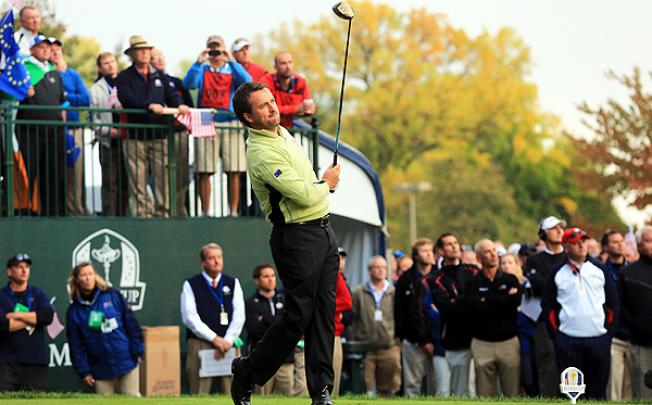 Graeme McDowell of Europe hits the first shot of the 39th Ryder Cup in Medinah. Photo: AFP