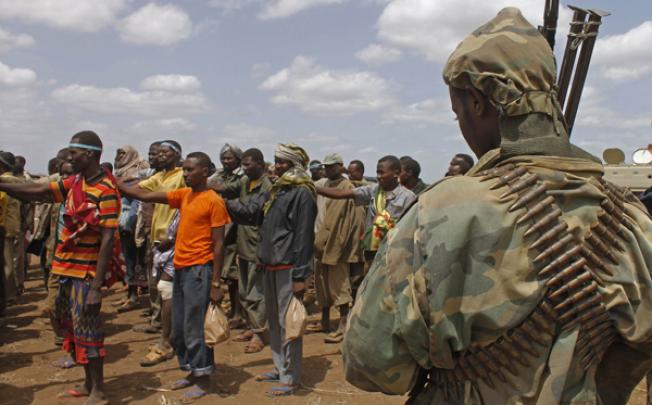 Members of the al-Qaeda linked al-Shebab after giving themselves up to forces of the African Union Mission in Somalia. Photo: AFP