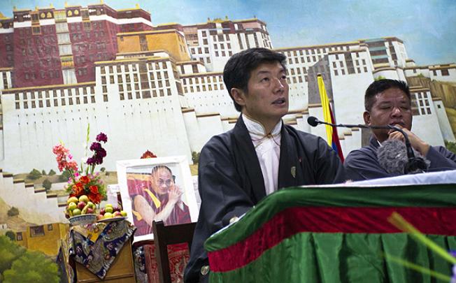 Prime minister of Tibet's government-in-exile Lobsang Sangay speaks to the media in Dharmsala, India on Friday. Photo: AP