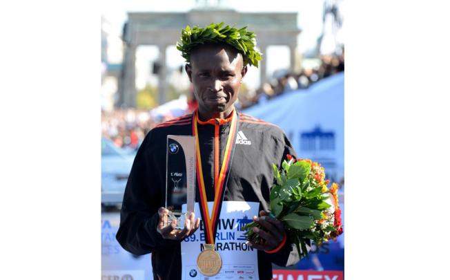 Geoffrey Mutai celebrates his Berlin win. Photo: AFP